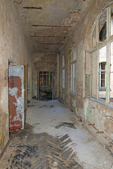 Long corridor in an old abandoned building