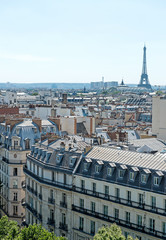 Paris, France. View of the Eiffel Tower above the rooftops of Paris. Aerial view of city Paris 