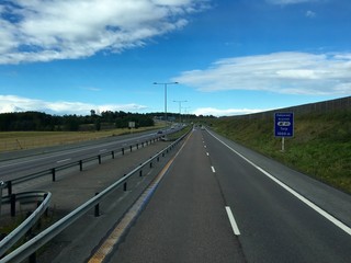 Fototapeta premium Norwegian highway in Vestfold county in Eastern Norway. Part of the European route E18.