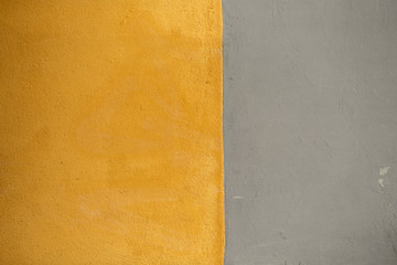 Wall painted in grey and yellow colors