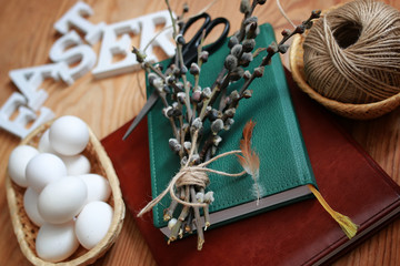 willow and egg on a wooden background