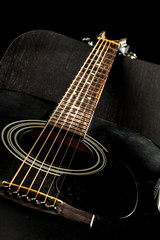Obraz na płótnie Canvas Acoustic Guitar in black and white the music room