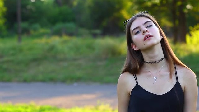 Young beautiful girl shows emotions proude pride