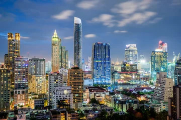 Poster Bangkok city skyline and skyscraper at night in Bangkok,Thailand © ake1150