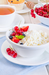 Fresh cottage cheese with berries for breakfast