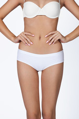 Naklejka na ściany i meble health and beauty - woman in cotton underwear showing slimming c