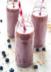 Blueberry milkshake in the bottles