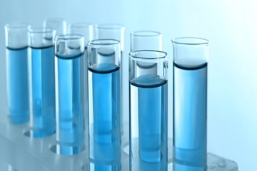Test tubes with blue samples, close up