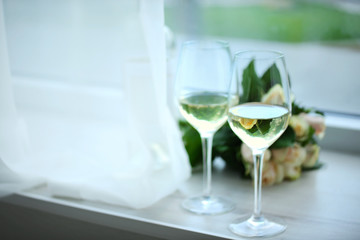 Gentle composition of romantic date with wine and flowers