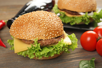 Fresh hamburgers with cola, closeup