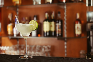 Cocktail in glass on bar counter