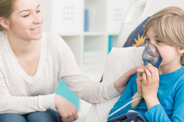 Assisting her little brave patient