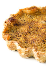 Homemade pumpkin pie isolated on white background

