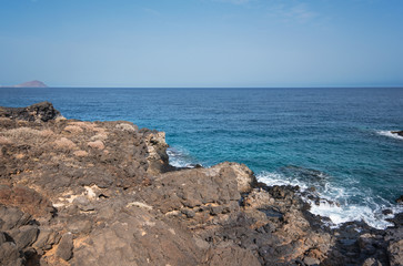 Fototapeta na wymiar Volcanic landscape. South Tenerife coastline, Canary island, Spain.