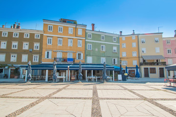 Fototapeta premium Old houses and cafes on waterfront in town of Cres, Island of Cres, Kvarner, Croatia 