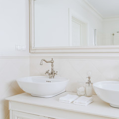 Fototapeta na wymiar Designed washbasins in retro bathroom