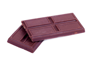 Piece of dark Chocolate isolated on white background
