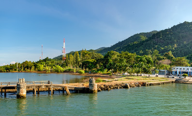 Port ferry boat in Koh Chang Island, Thailand.Concrete ferry pier. Travel inspiration.