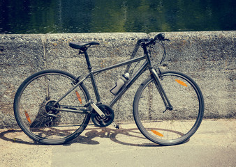 Fototapeta na wymiar bicycle parked on the waterfront
