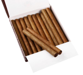 Cigarillos in box isolated on white