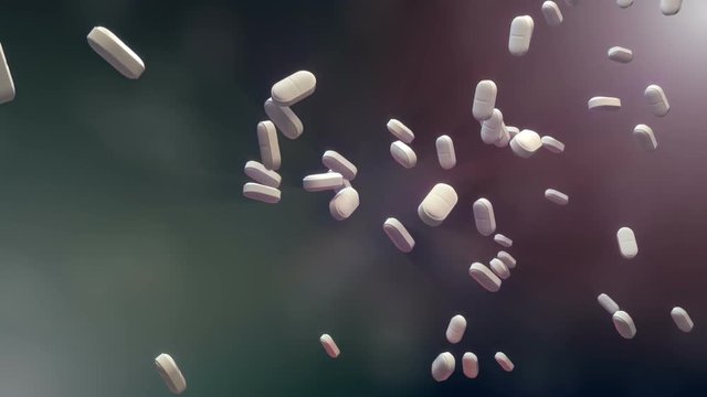 Pills fall down the screen in slow motion