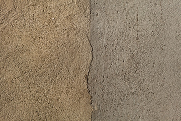 Beige painted stucco wall. Background texture