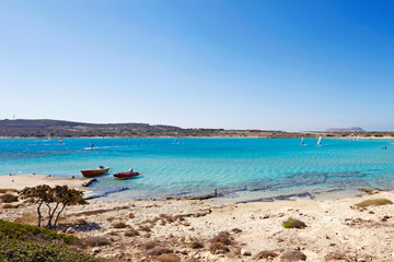 Windsurfers in Makrys Gialos of Karpathos, Greece