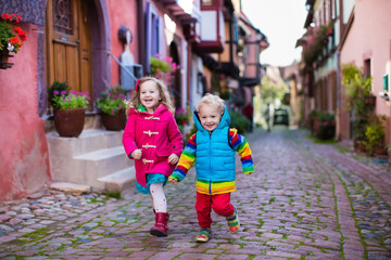 Children in historical city center in France