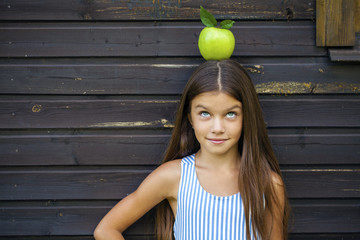 Picture of beautiful girl with green apple