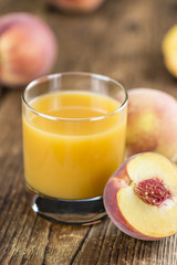 Fototapeta na wymiar Fresh made Peach juice