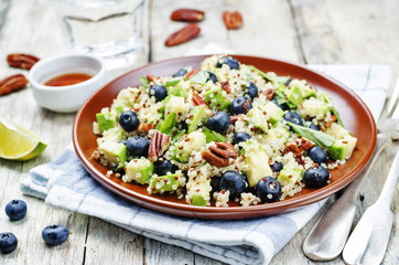 Quinoa avocado blueberry pecan salad with maple syrup lime dress