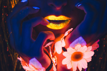 portrait, lips and hands in the neon light