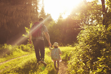Father traveling with a child. Little explorer with the teacher