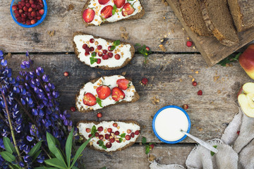 background with breakfast on a rustic wooden table