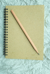 notebook on crumpled paper