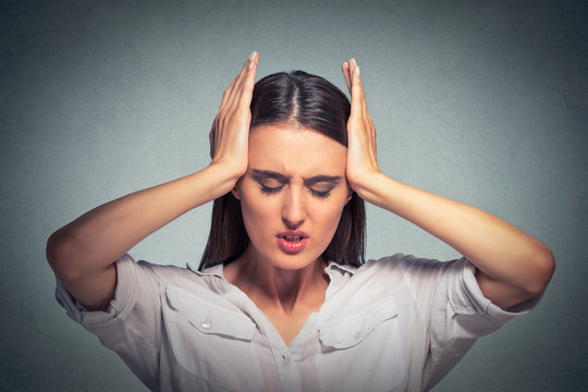 Stressed sad woman, having migraine, tension headache