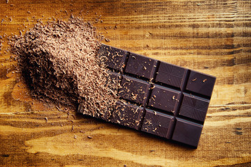 Cubes of chocolate and grated chocolate