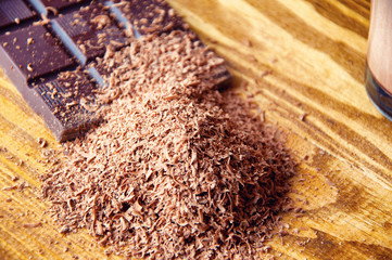 Cubes of chocolate and grated chocolate
