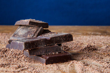 Cubes of chocolate and grated chocolate