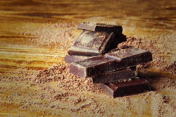 Cubes of chocolate and grated chocolate
