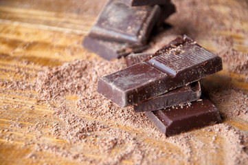 Cubes of chocolate and grated chocolate