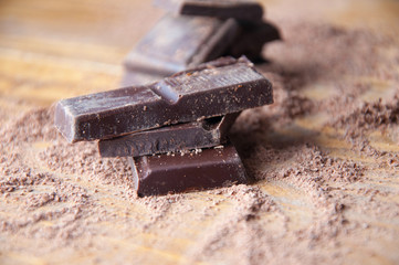 Cubes of chocolate and grated chocolate