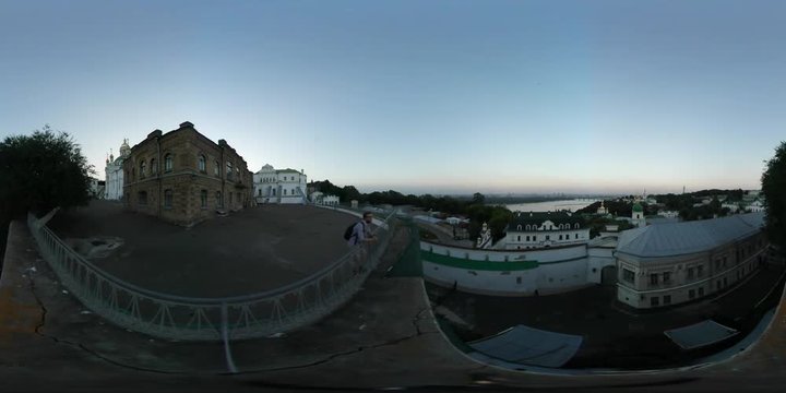 360Vr Video Man Observing Refectory Church Staning on Observation Deck Tourist is at Historical Religious Buildings Kyiv Pechersk Lavra Dusk Horizon