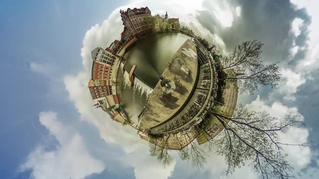 People in Old City on a River Bank vr Video 360 Little Planet Video Vintage Colorful Buildings Built Along a River Bank Cityscape Floating Clouds Blue Sky