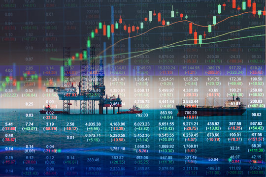 Stock market concept with oil rig in the gulf background,Double exposure