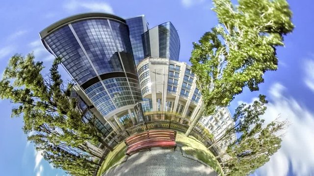 Little Tiny Planet 360 Degree Avenue Taras Shevchenko Kiev Modern Glass Building Bench in Alley Green Trees Lawns Walking People Cars Are Driven by Road