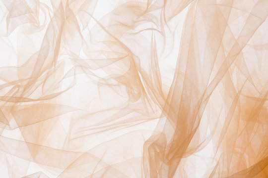 Background texture of white, airy stripes of chiffon fabric, tulle. Neutral  colors. Stock Photo by Jpavaliuk