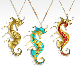 Three Gold Seahorses