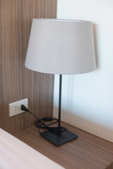 reading lamp on bedside table