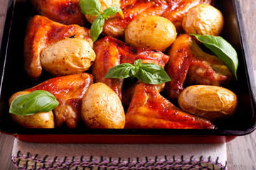 Grilled chicken wings and potato